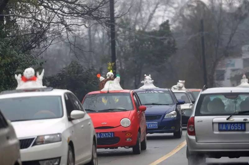 车顶堆个雪人蛮好玩的？扣1分罚50元2016这些隐形交规你必须知道