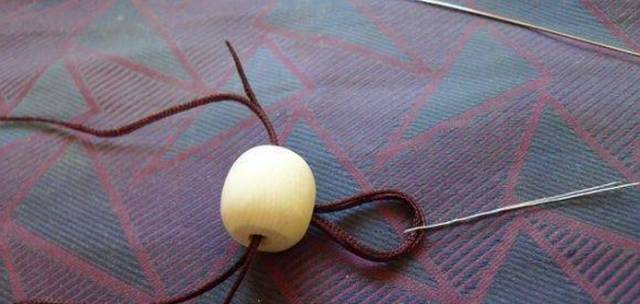 怎样穿手串三通佛头,手串佛头怎么穿小妙招