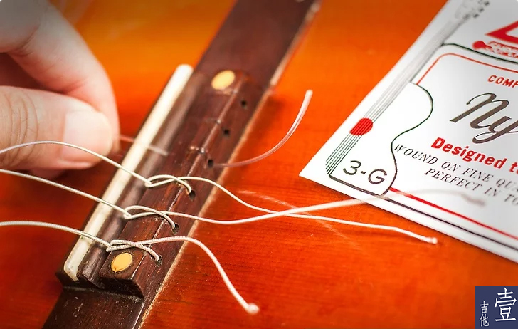 北航吉他,如何换吉他新弦