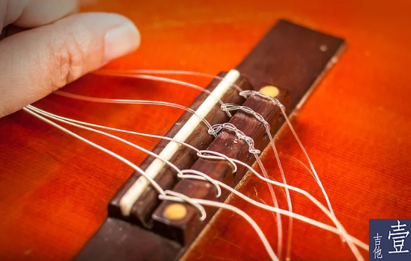 北航吉他,如何换吉他新弦