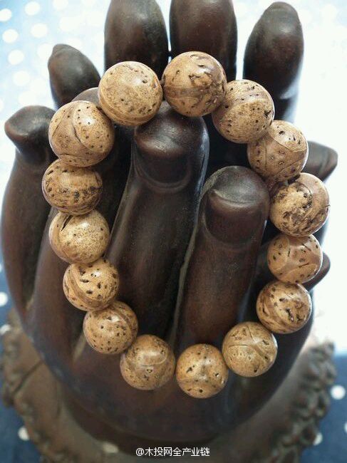 檀香木手串的功效与作用,牦牛骨手串的功效与作用