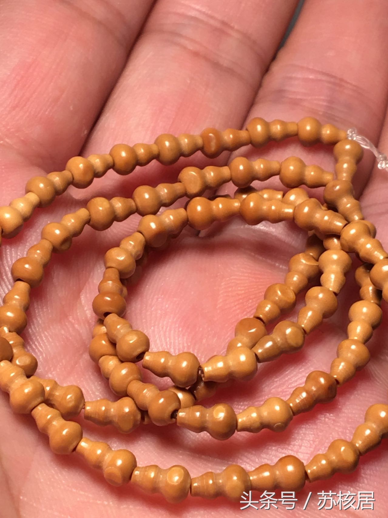 橄榄核手串越玩越黑,橄榄手串盘玩半年有玻璃化了