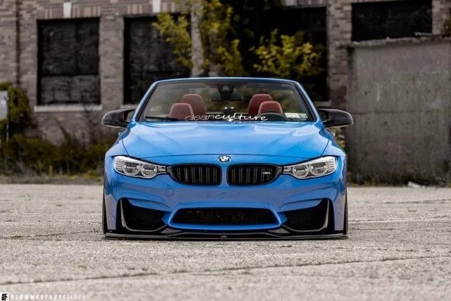 改装的宝马m4直接趴在地上了,普通的宝马m4可以开敞篷