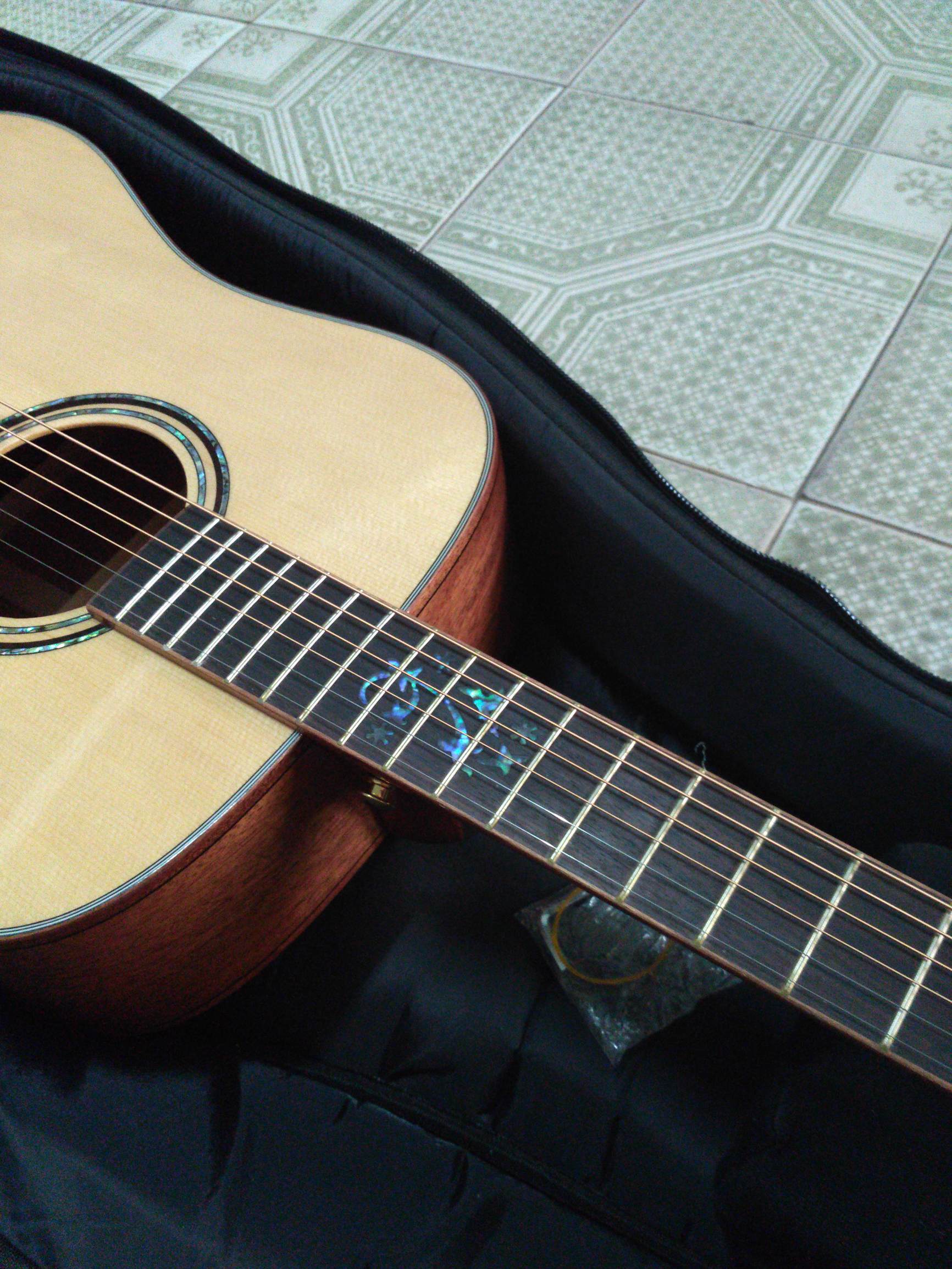 新手入门的合板吉他哪种最好,吉他单木好还是合板好