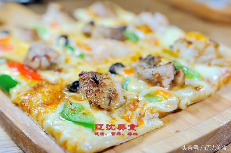 这家西餐厅融合欧美风味与中西风味，披萨永远比别人家多一块