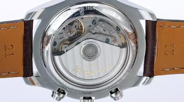 浪琴月相gs真假对比,浪琴手表质保卡真假图片对比