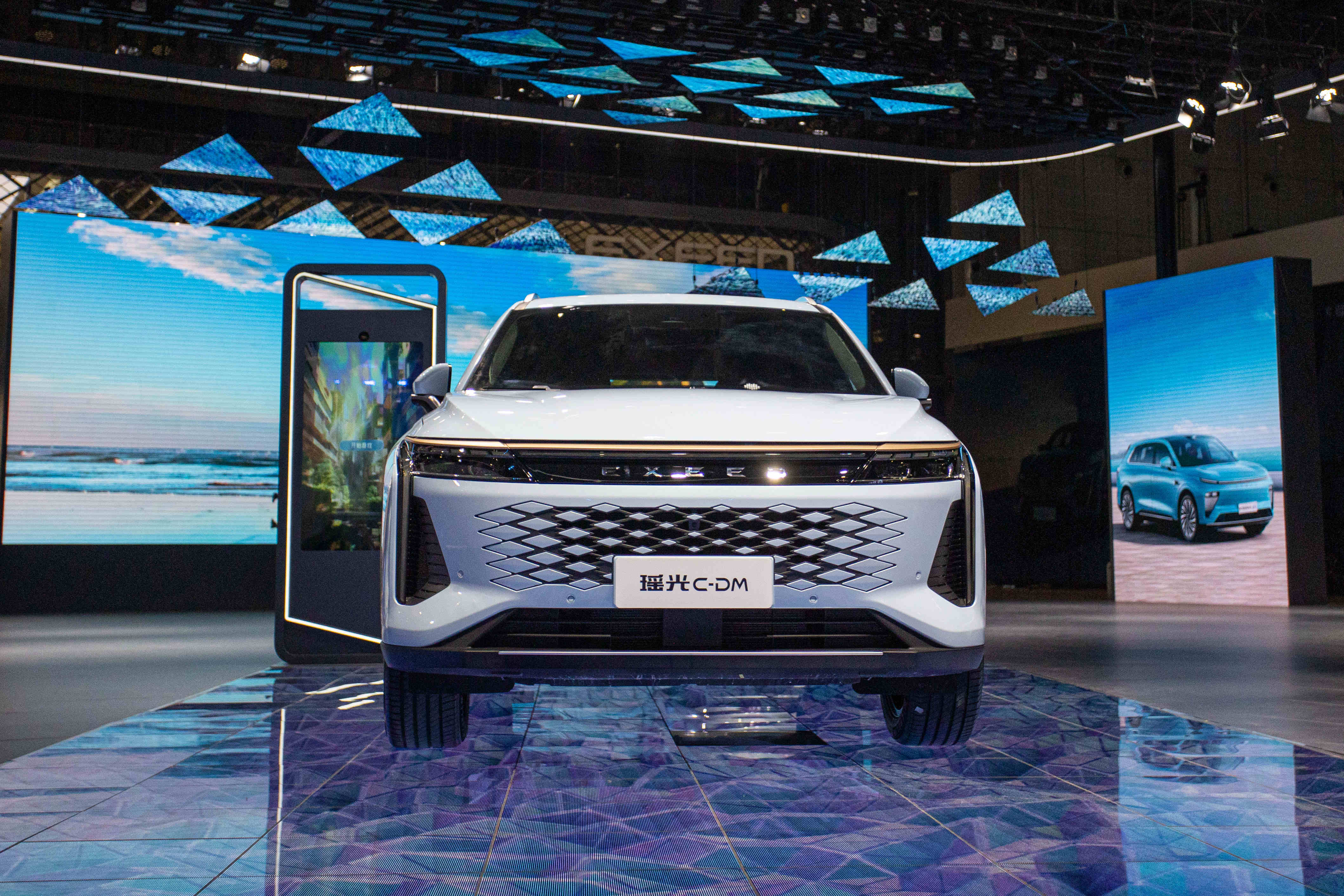 奇瑞鲲鹏超性能电混c-dm系统亮相,奇瑞鲲鹏超能混动c-dm系统发布会