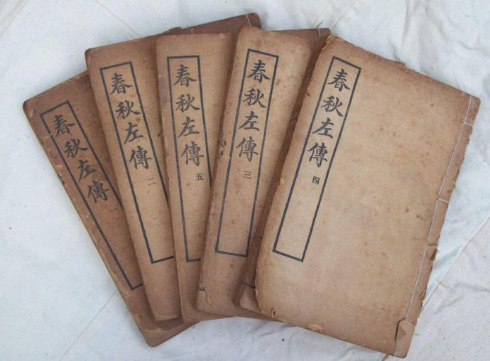 上联坐北朝南吃西瓜下联怎么对,坐南朝北吃西瓜下联是什么