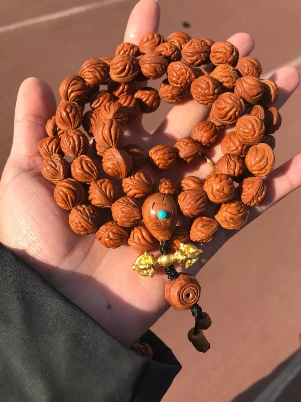 小桃核手串玩半个月什么效果,桃核手串买来怎么玩