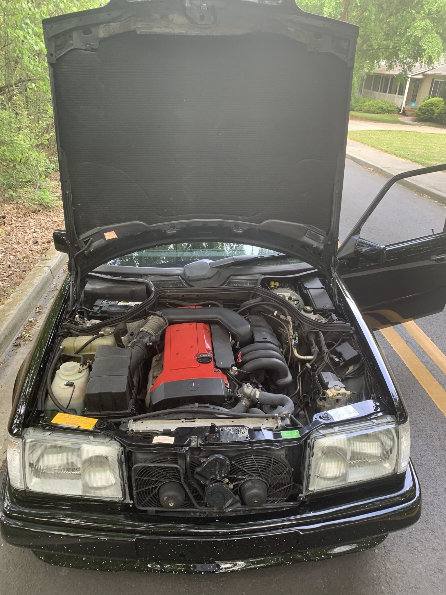 你信么？30年前的“小虎头”奔驰E级，至今还有人念念不忘