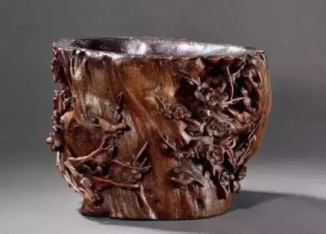 木雕兽头什么寓意,长颈鹿木雕婚礼摆件有什么寓意