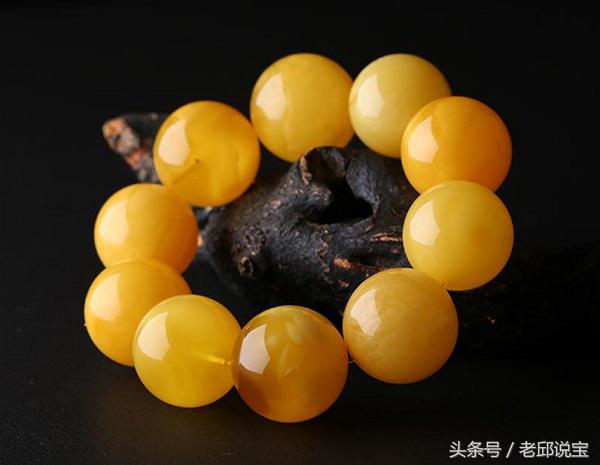 琥珀蜜蜡大料,为什么人都喜欢琥珀料