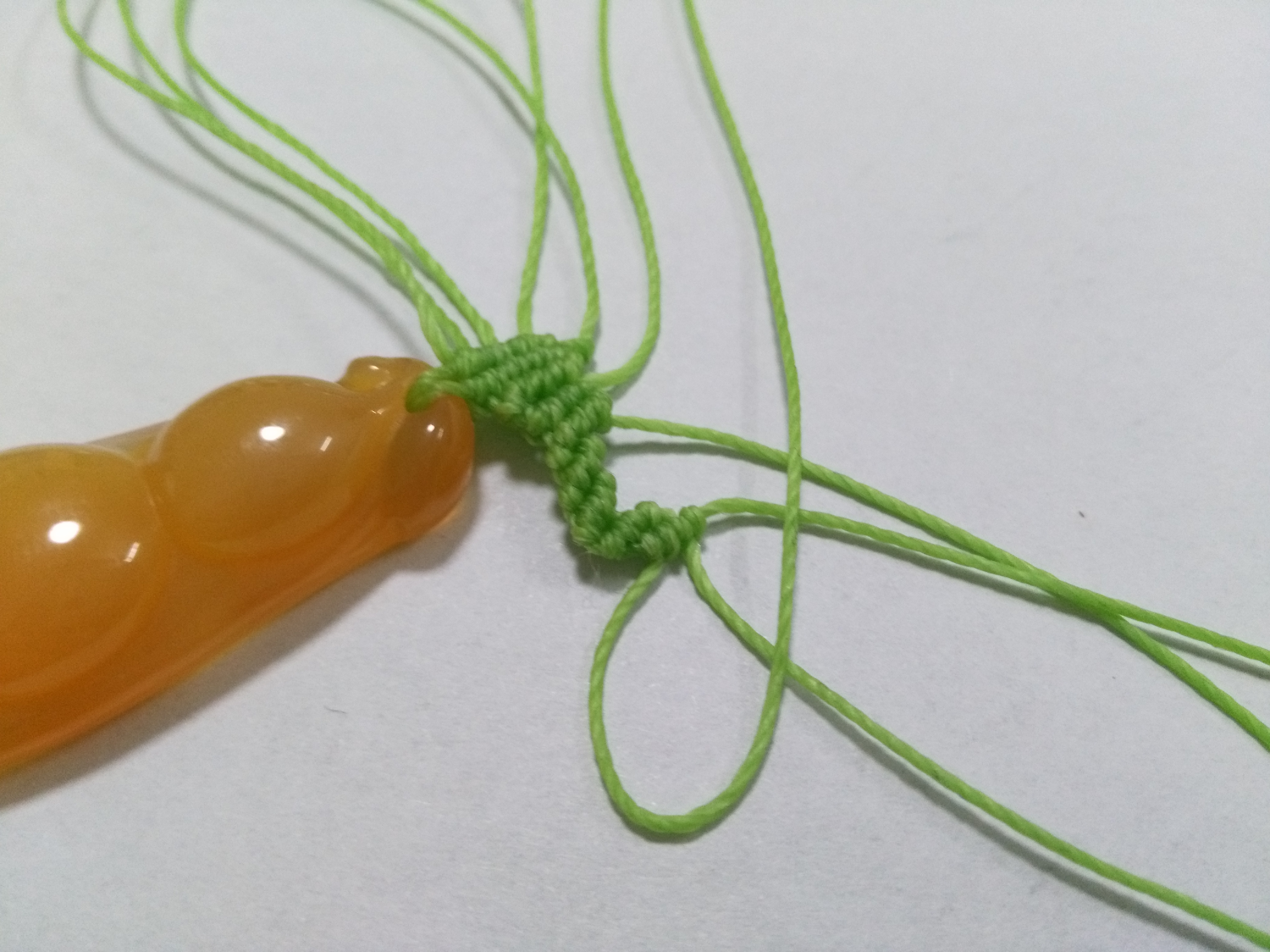 玛瑙豆子编手机吊坠法教程,玉豌豆吊坠怎么编绳