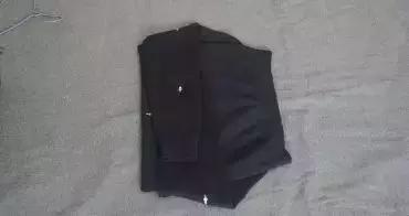 教你一个挂毛衣的办法,毛衣这样挂下摆越挂越长小技巧