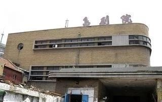 青岛哪几家电影院有情侣座,青岛大光明电影院的历史