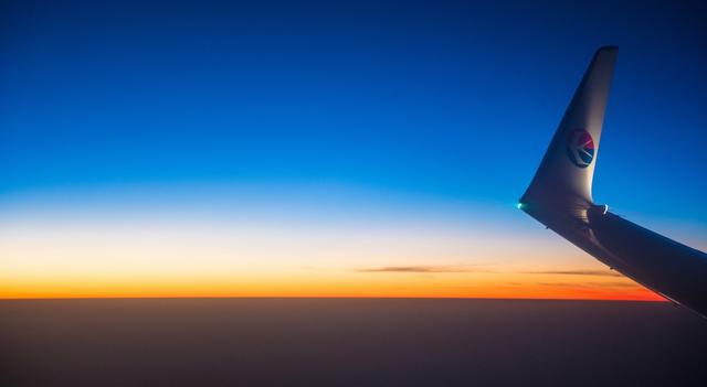 飞机高空拍摄效果图,飞机靠窗风景照片怎么拍