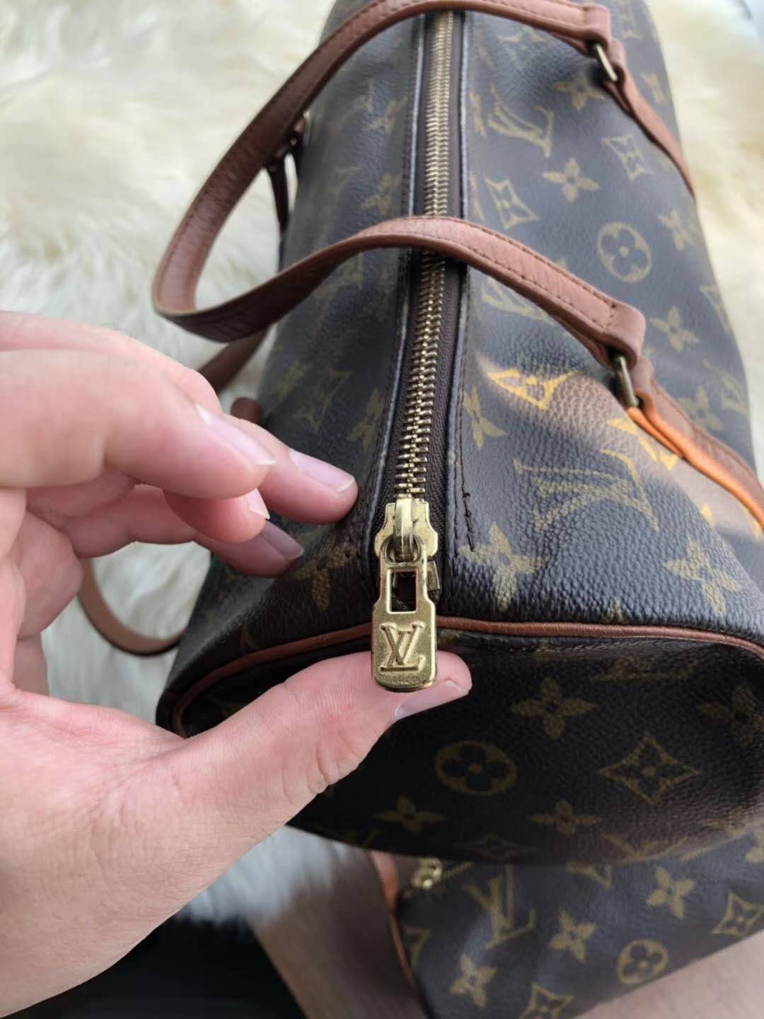 如何鉴别lv中古包有没有换皮,日本中古lv包