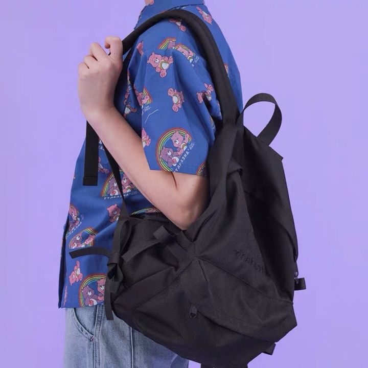 黑色抽绳双肩包出街百搭,双肩包出街推荐大学生小巧