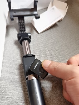 华为有线自拍杆的使用方法及操作,华为手机用自拍杆的使用方法图解
