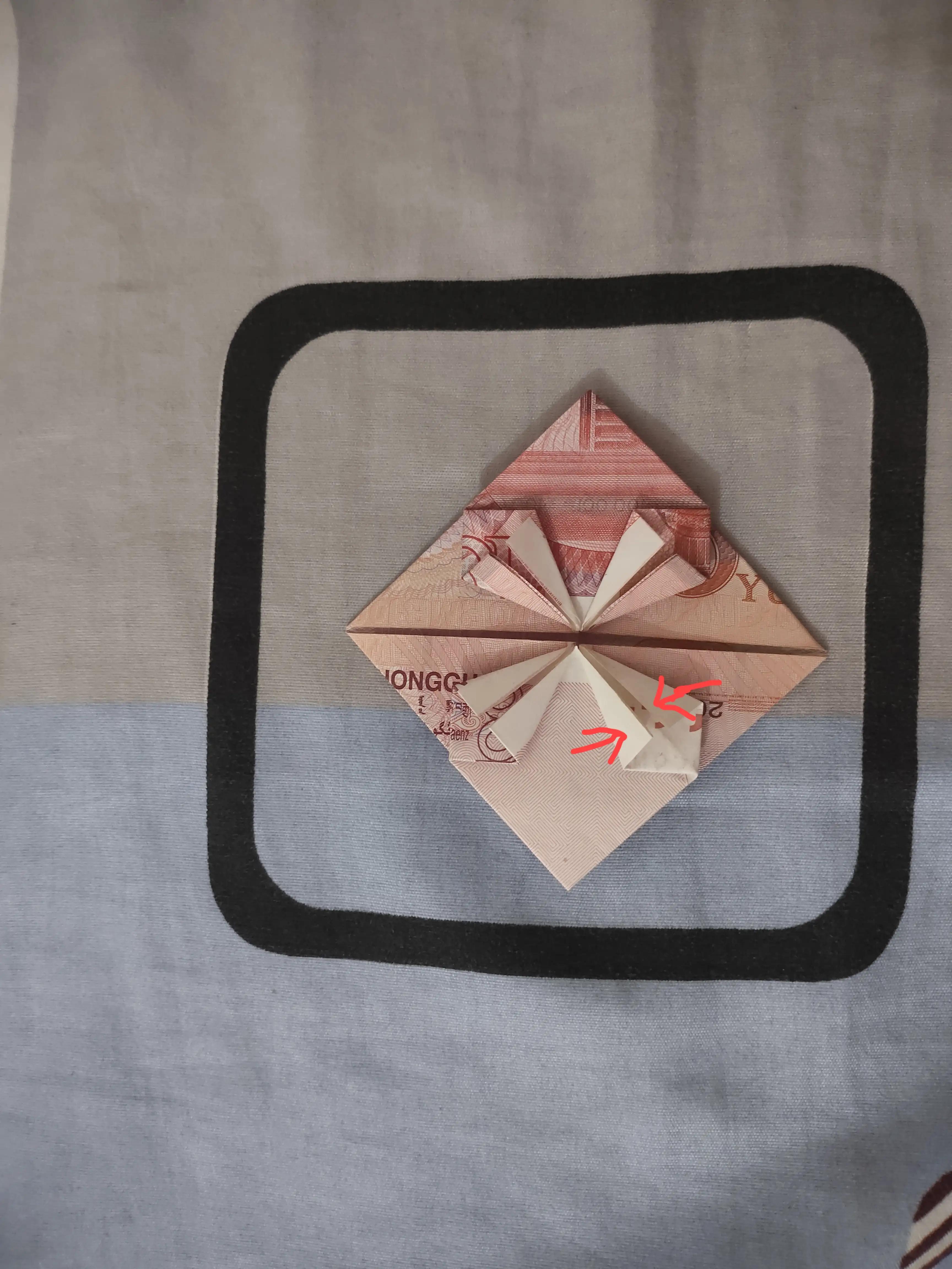 一百块钱折双爱心步骤,折爱心步骤