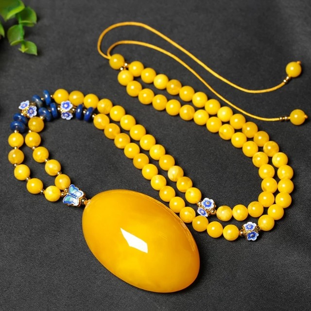 蜜蜡鸡油黄的好还是骨瓷白的好,天然鸡油黄蜜蜡是什么