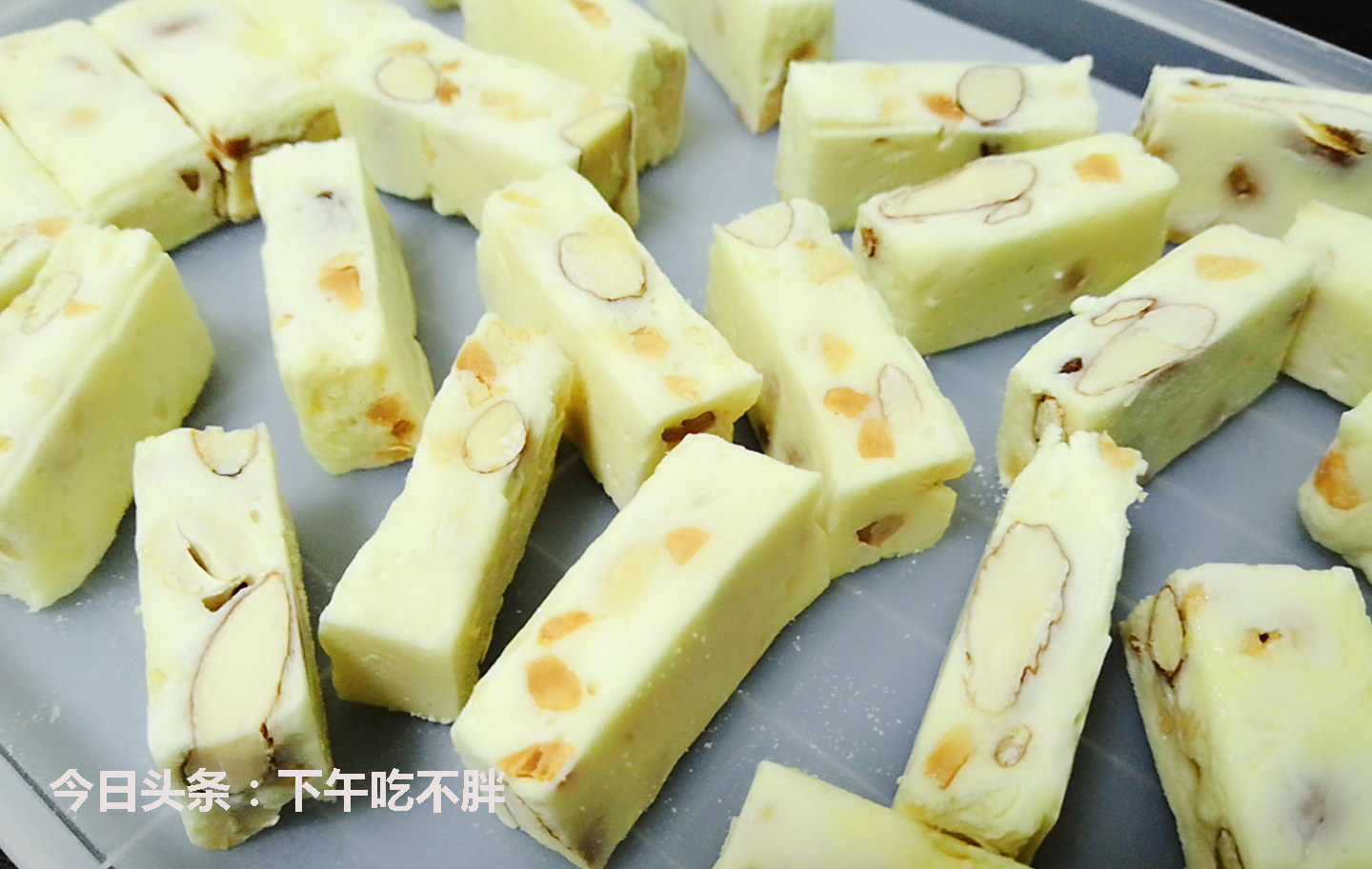 正宗牛轧糖到底粘不粘牙,牛轧糖怎么做不粘牙还软