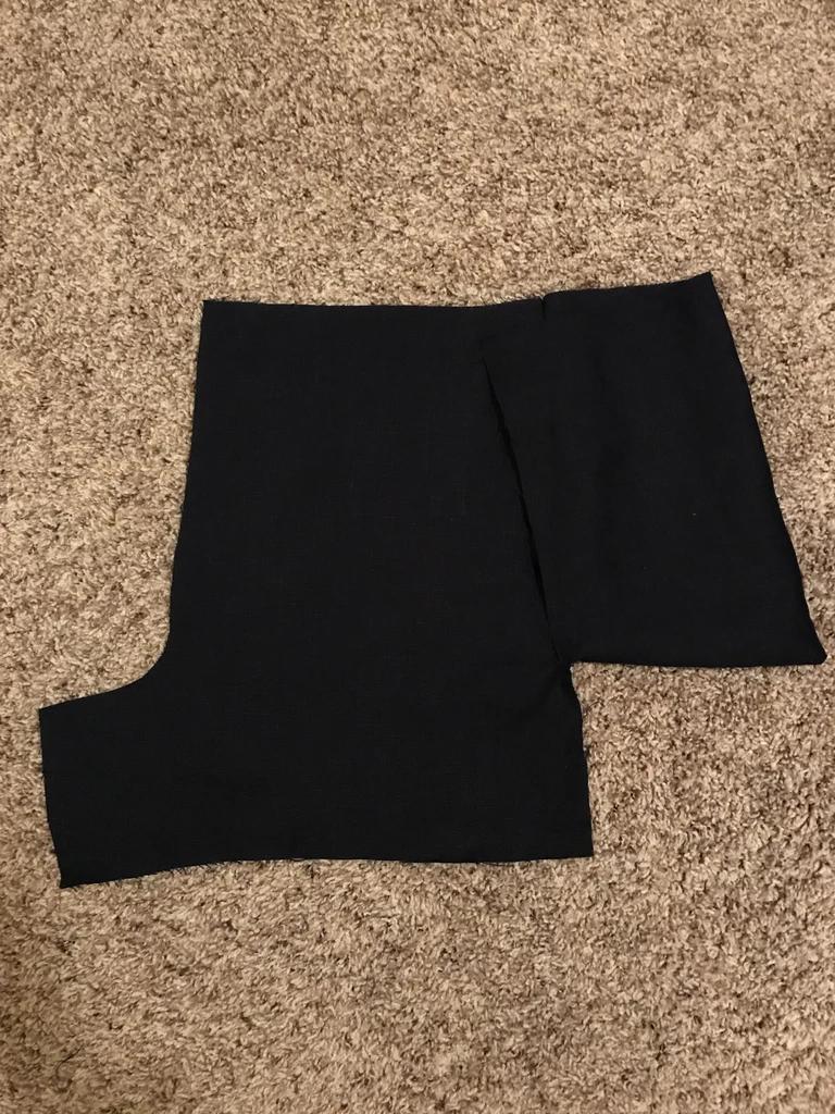 短裤一根布腰带的系法,短裤的一条裤带怎么系