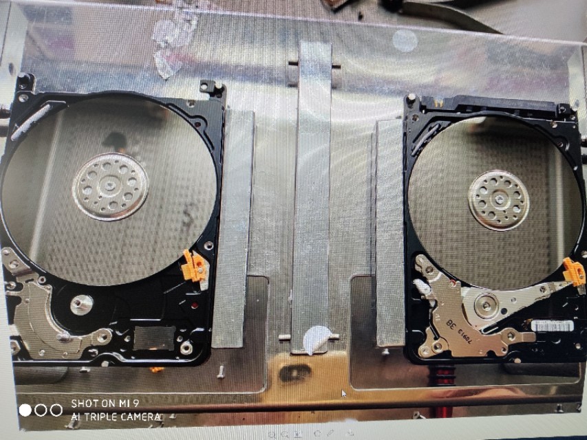 西数硬盘咔咔响的原因,移动硬盘摔了一下嗒嗒响无法识别