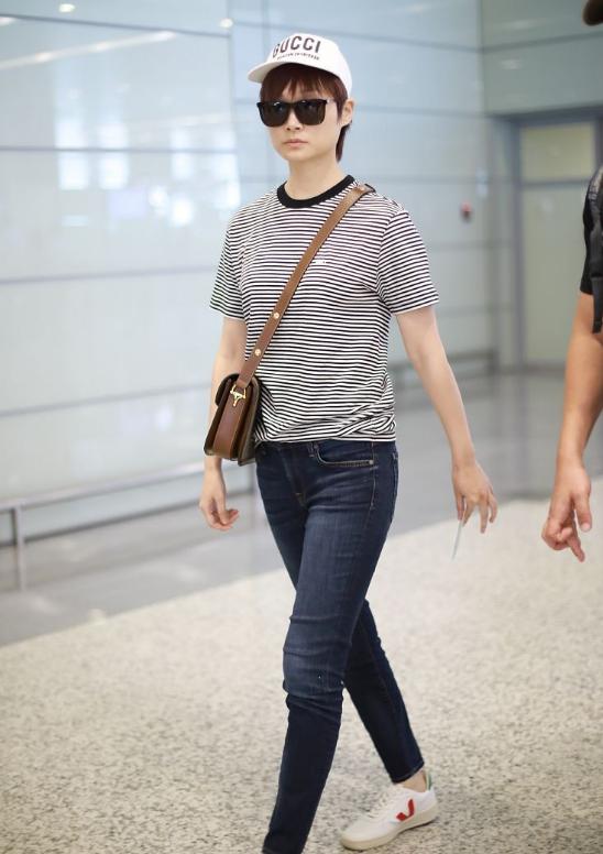 李宇春穿搭又酷又野宛若黑天鹅,李宇春早期上造型改造节目