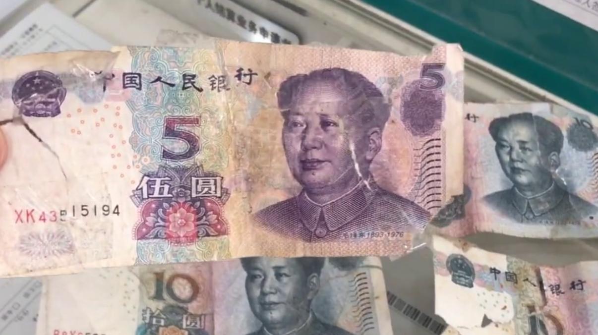 人民币有破损怎么存银行要带什么,人民币破损到什么程度就不给换了