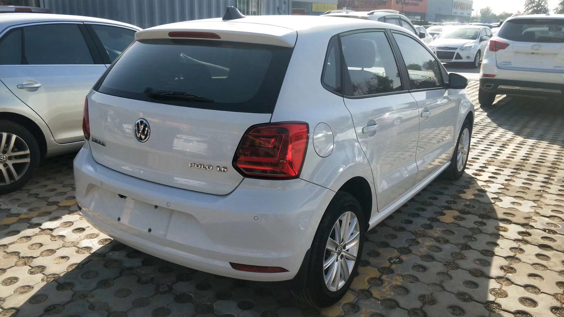 15年大众polo手动1.4二手车值得吗,15年大众polo1.6自动挡多少钱