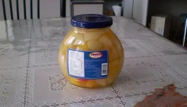 罐头瓶盖打开小妙招,罐头瓶盖打不开扎个洞