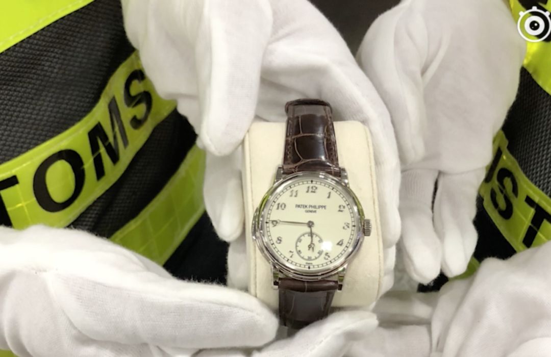 海关行李箱内查获巨款如何处理,行李箱里放现金过海关被查