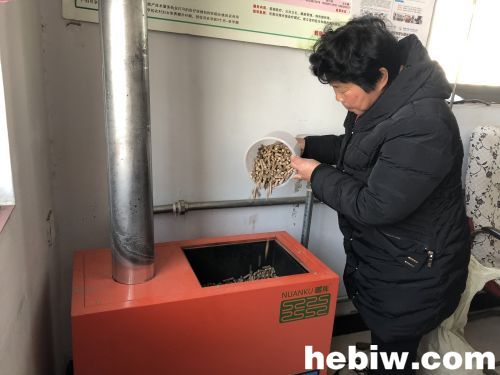 秸秆颗粒取暖炉子烧水,秸秆颗粒燃料取暖