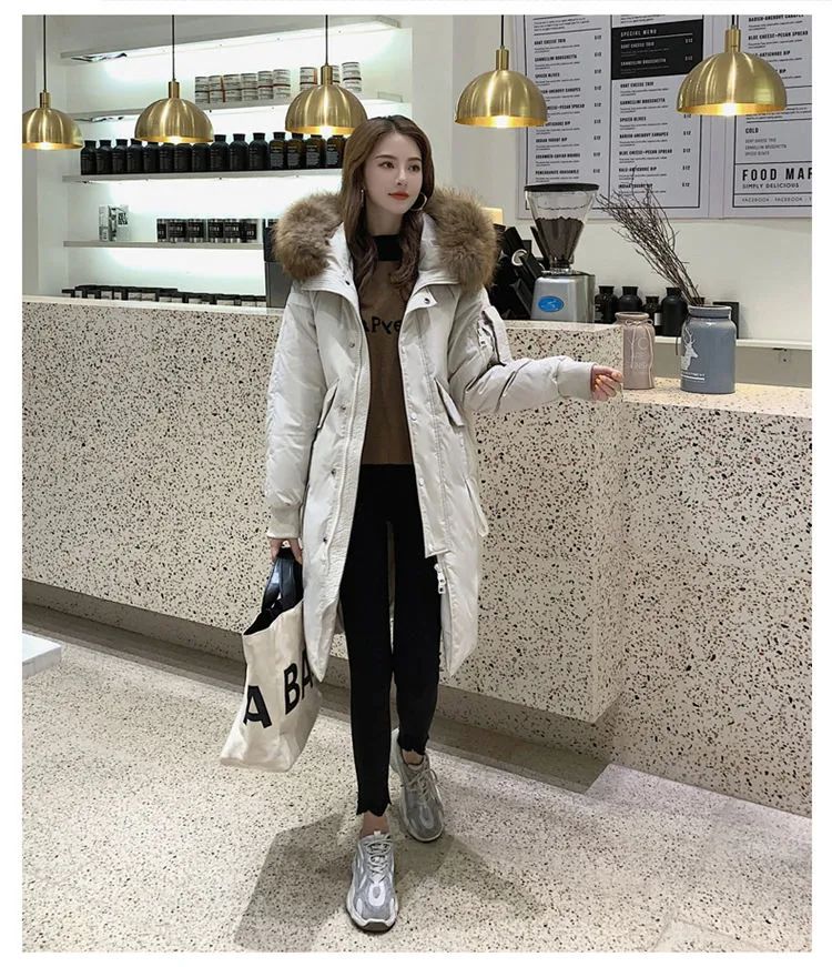 羽绒服千万别乱买这样穿又暖又美,羽绒服穿大的暖还是贴身的暖