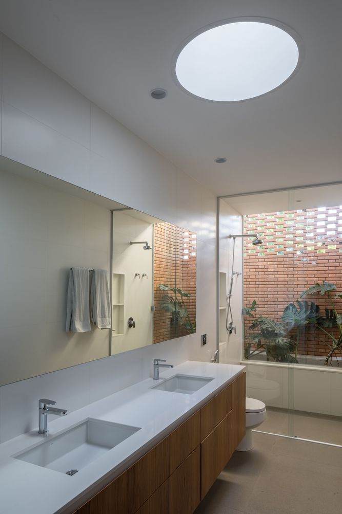 巴西利亚原始的清水混凝土与红砖打造的别墅