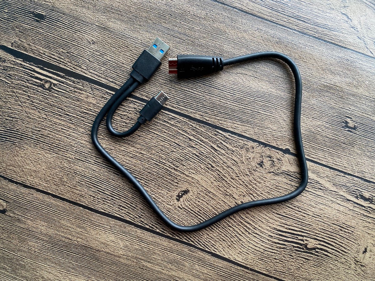 奥睿科外置光驱怎么放刻录盘,奥睿科三合一优盘解析