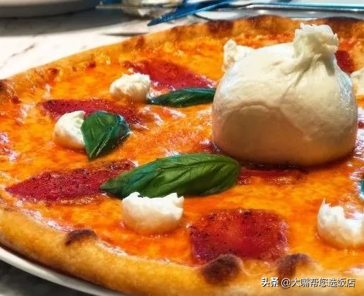 #吃遍大连#披萨的诱惑!一个蕴藏着芝士力量的神物