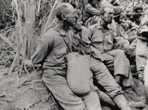 抢战俘戒指,日军举起*刀军**,手指一同砍下!巴丹行军细节