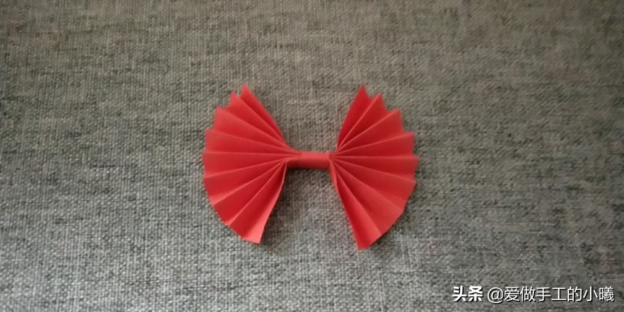 儿童折纸简单手工幼儿园蝴蝶结,蝴蝶结手工折纸超简单正方形纸