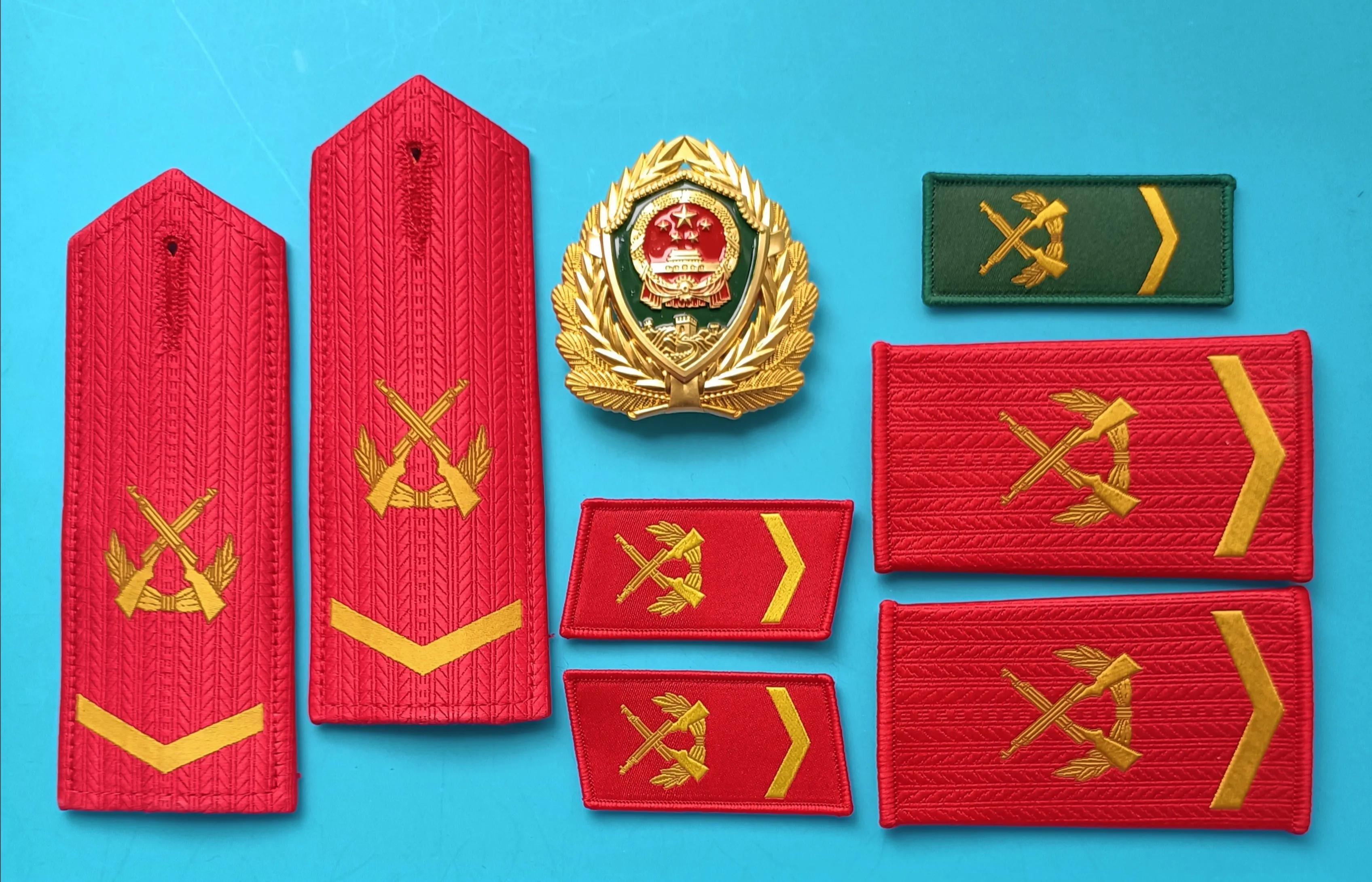 毛启国军装,毛启国警用帽徽