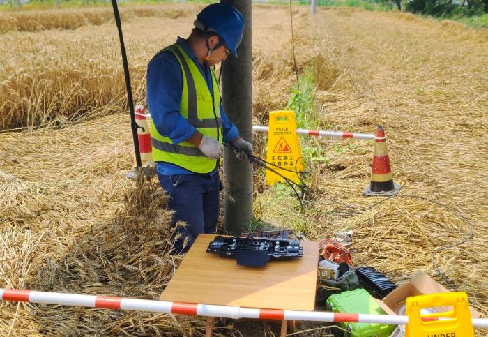 不惧考验,战高温保通信