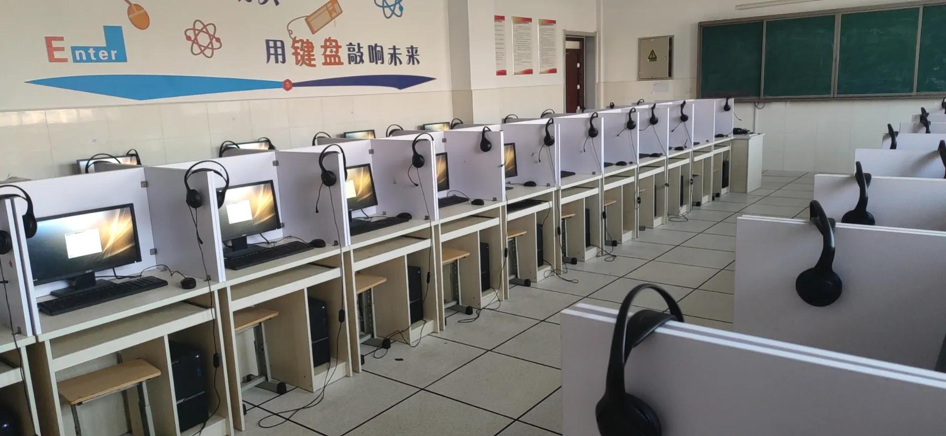 重做微机室电脑系统，迎接英语人机对话考试