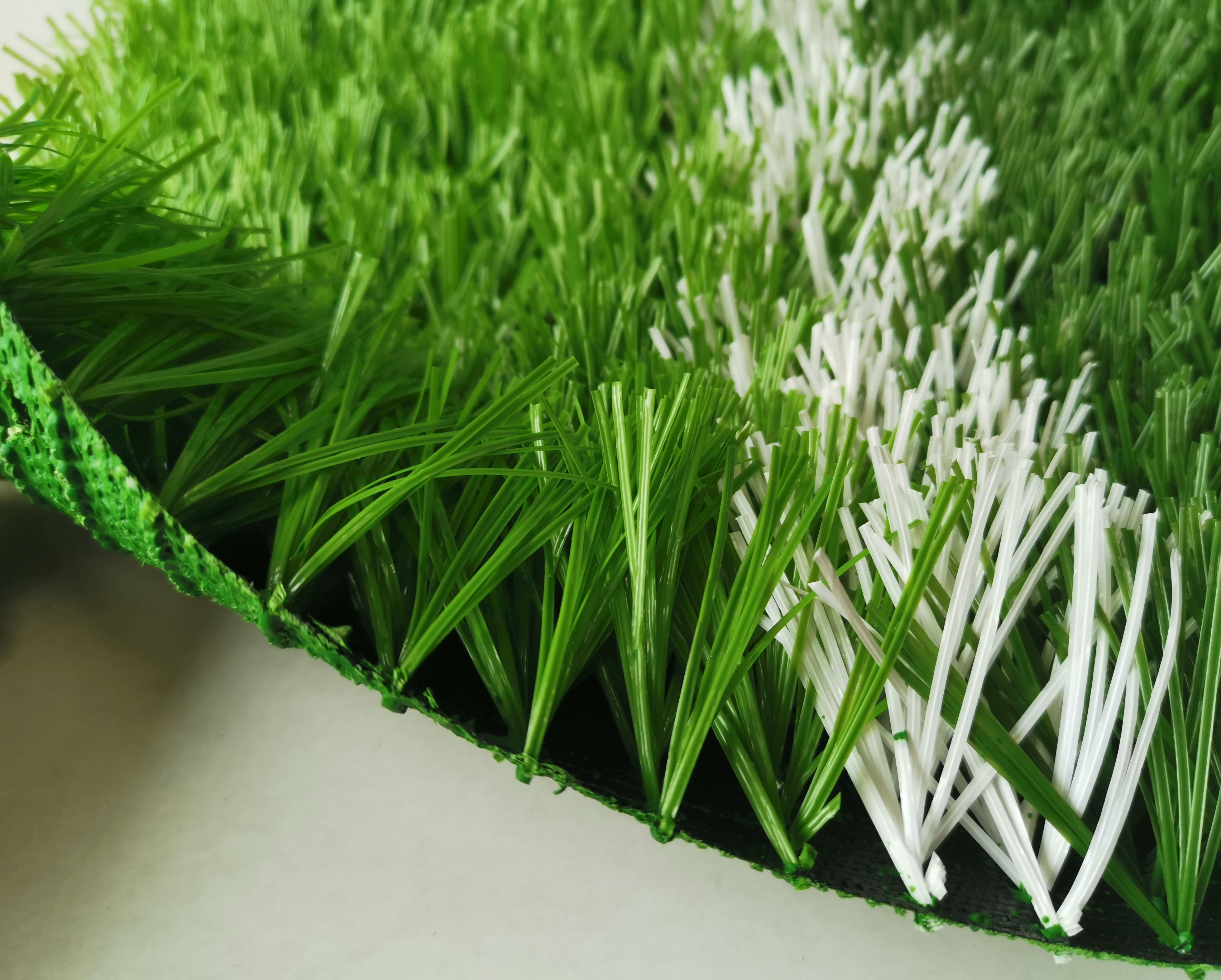 宣城人造草皮足球场翻新包工包料,足球场草皮每平米价格