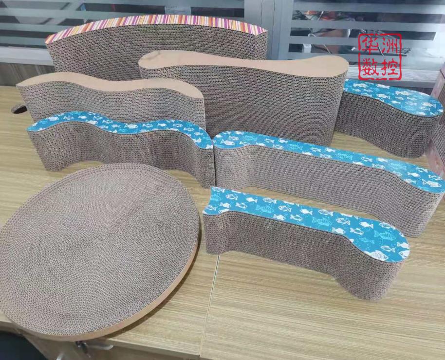 华洲数控*四代第**猫抓板机器研发_数控线锯机_华洲数控发布