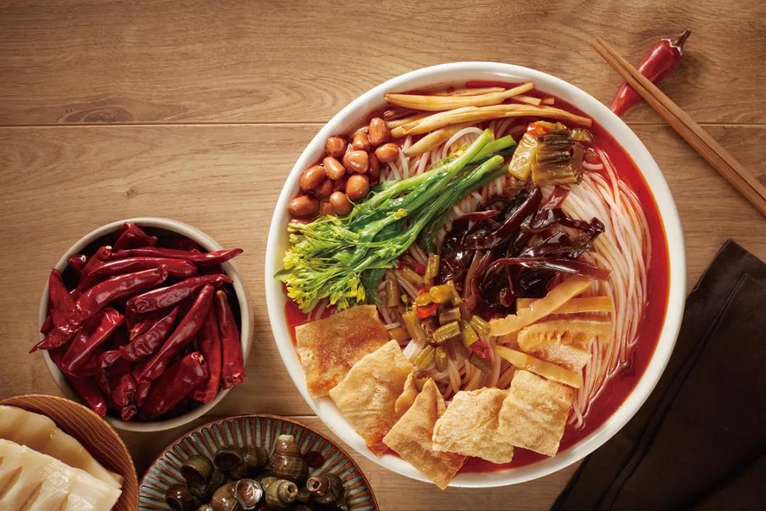 柳州螺蛳粉怎么发展起来的,柳州螺蛳粉投资一百亿