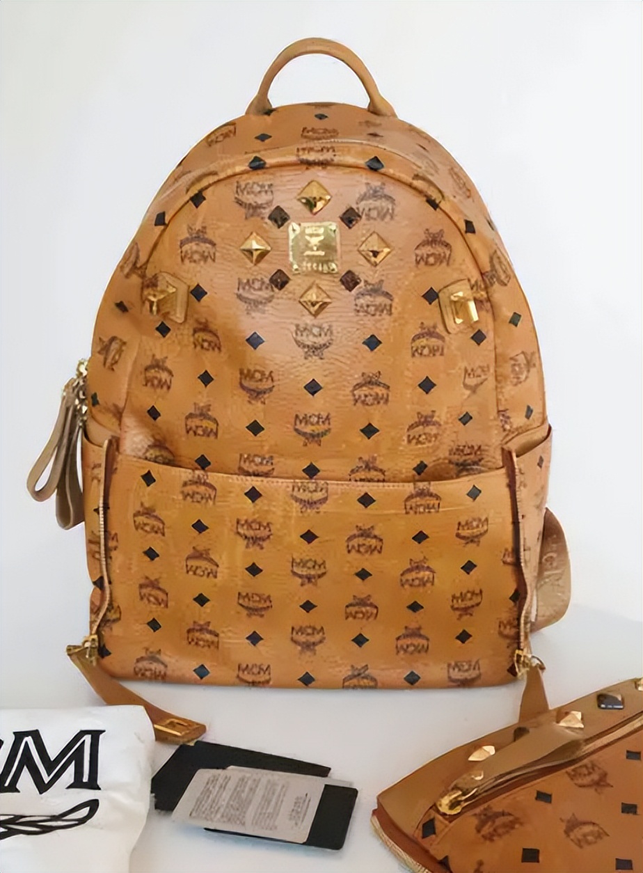 奢侈品鉴定教你辨别爆款lv圆筒包,mcm双肩包真假区别图片