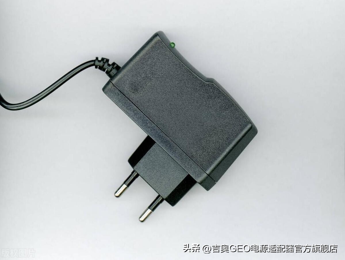 电源适配器滋滋响声发热,电脑电源适配器发热