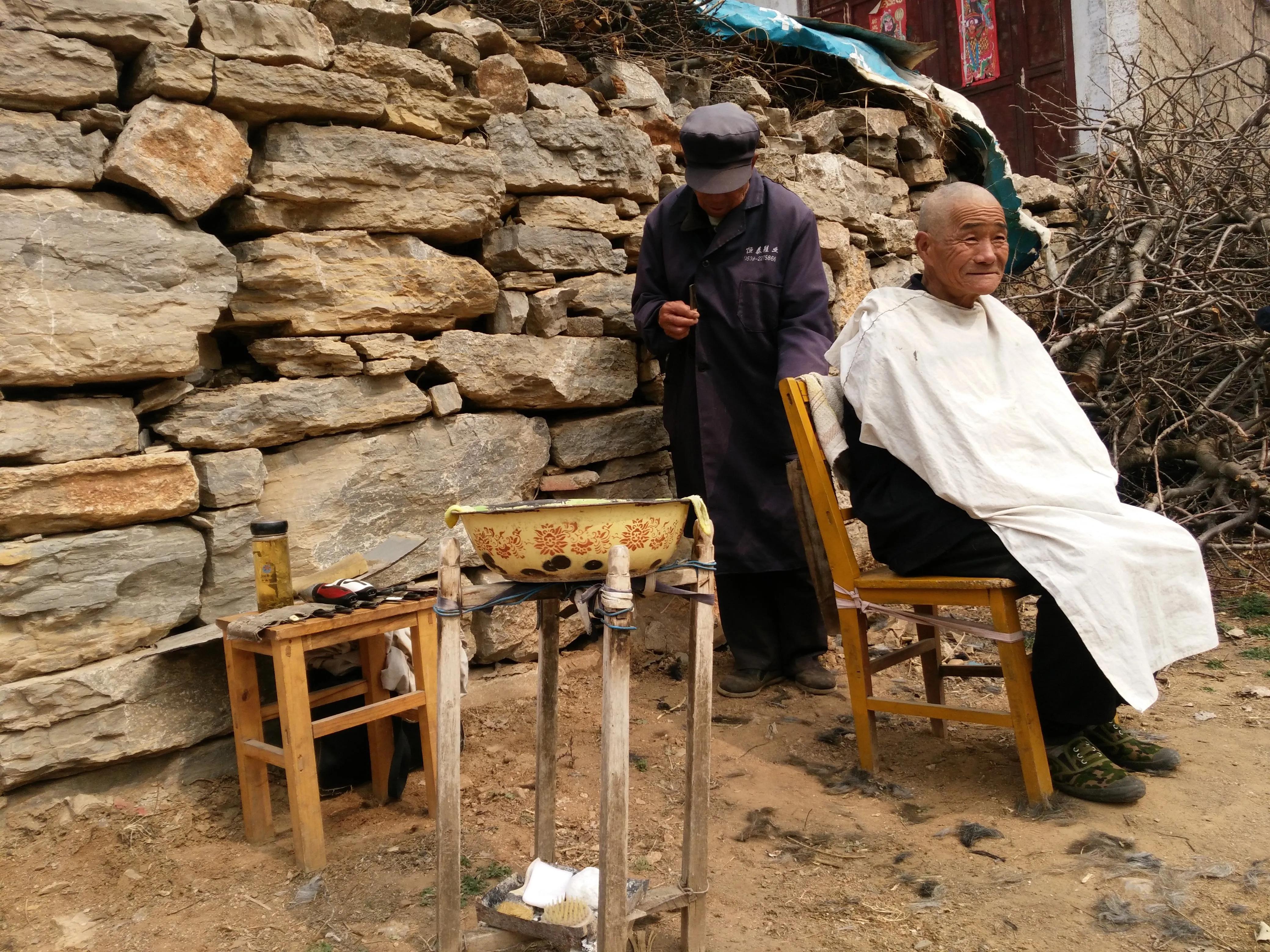 “荣军”剃头匠朱从贵