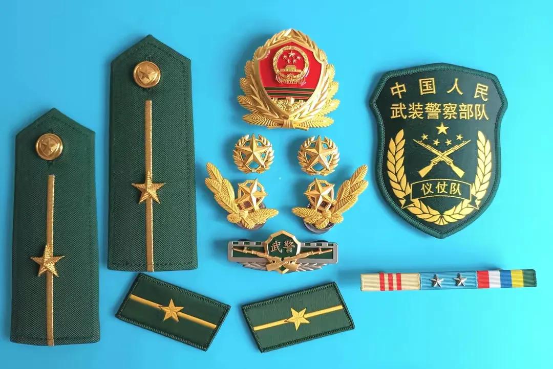 毛启国收藏帽徽图片,中国陆军狼牙特种部队肩章图片